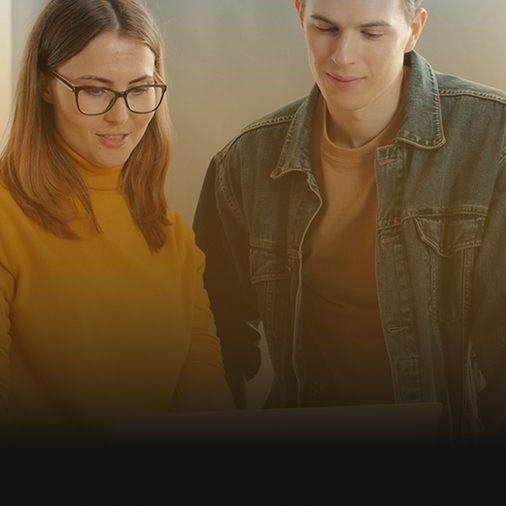 Two SEO specialists reviewing a technical audit together