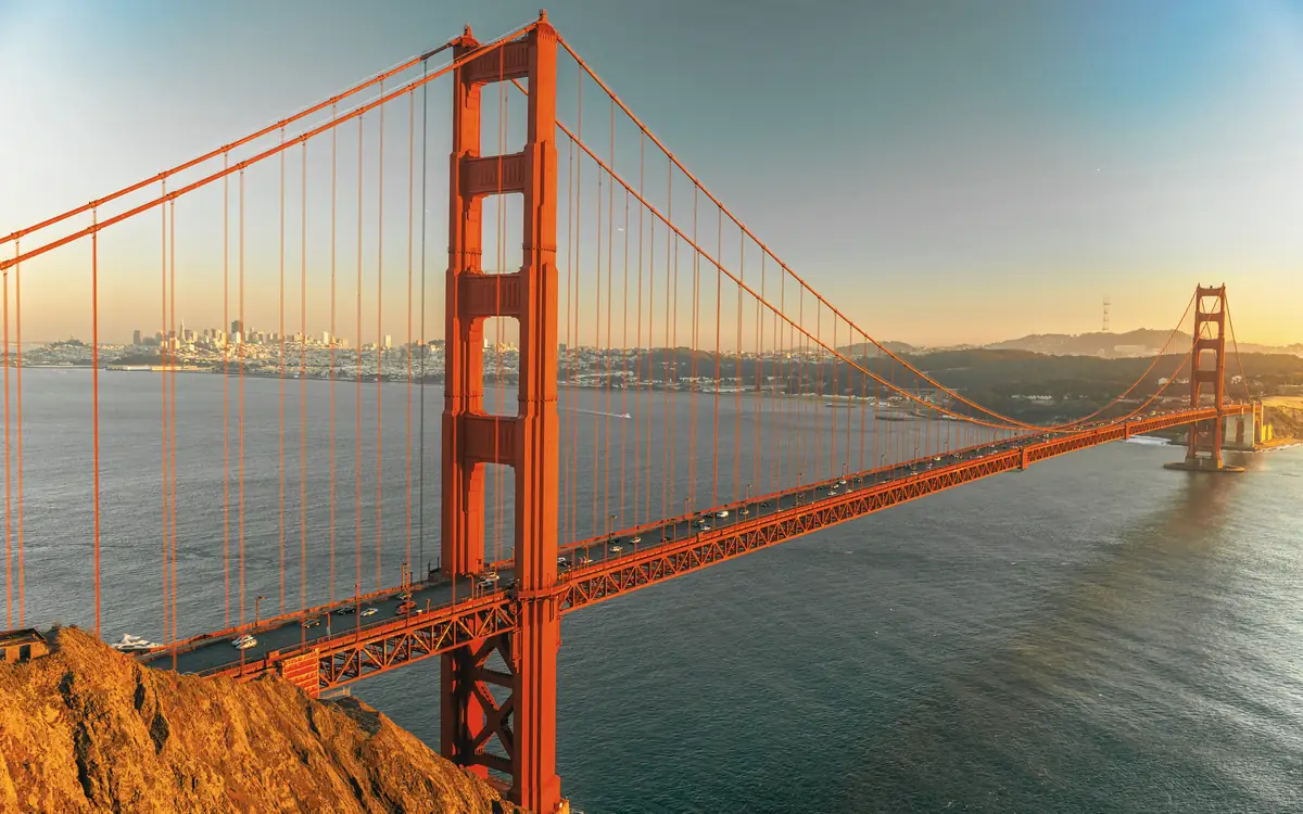 The Golden Gate Bridge over the bay at sunset